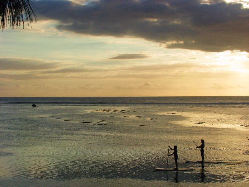 Coucher du soleil sur une plage de Saint-Gilles,  la Réunion