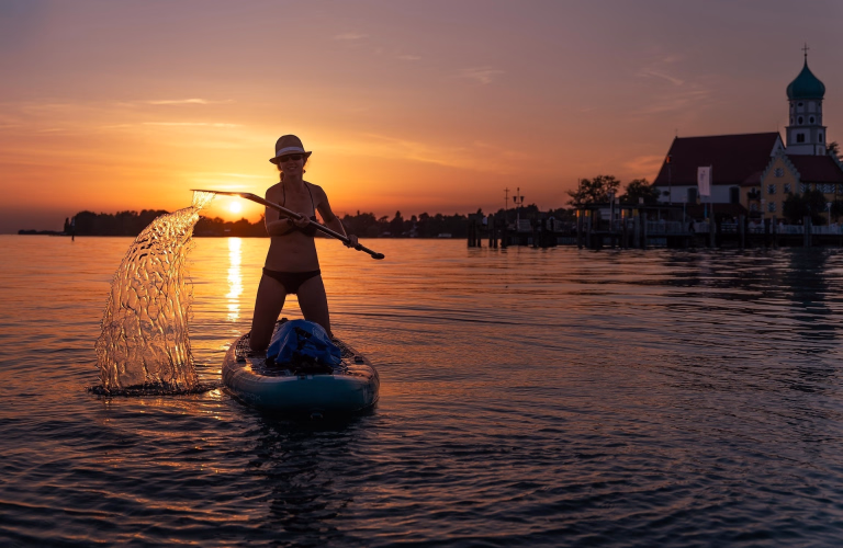 Photo d'une pratiquante de paddle